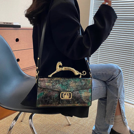 Stylish Leather Crossbody Bag with Designer Metal Handle