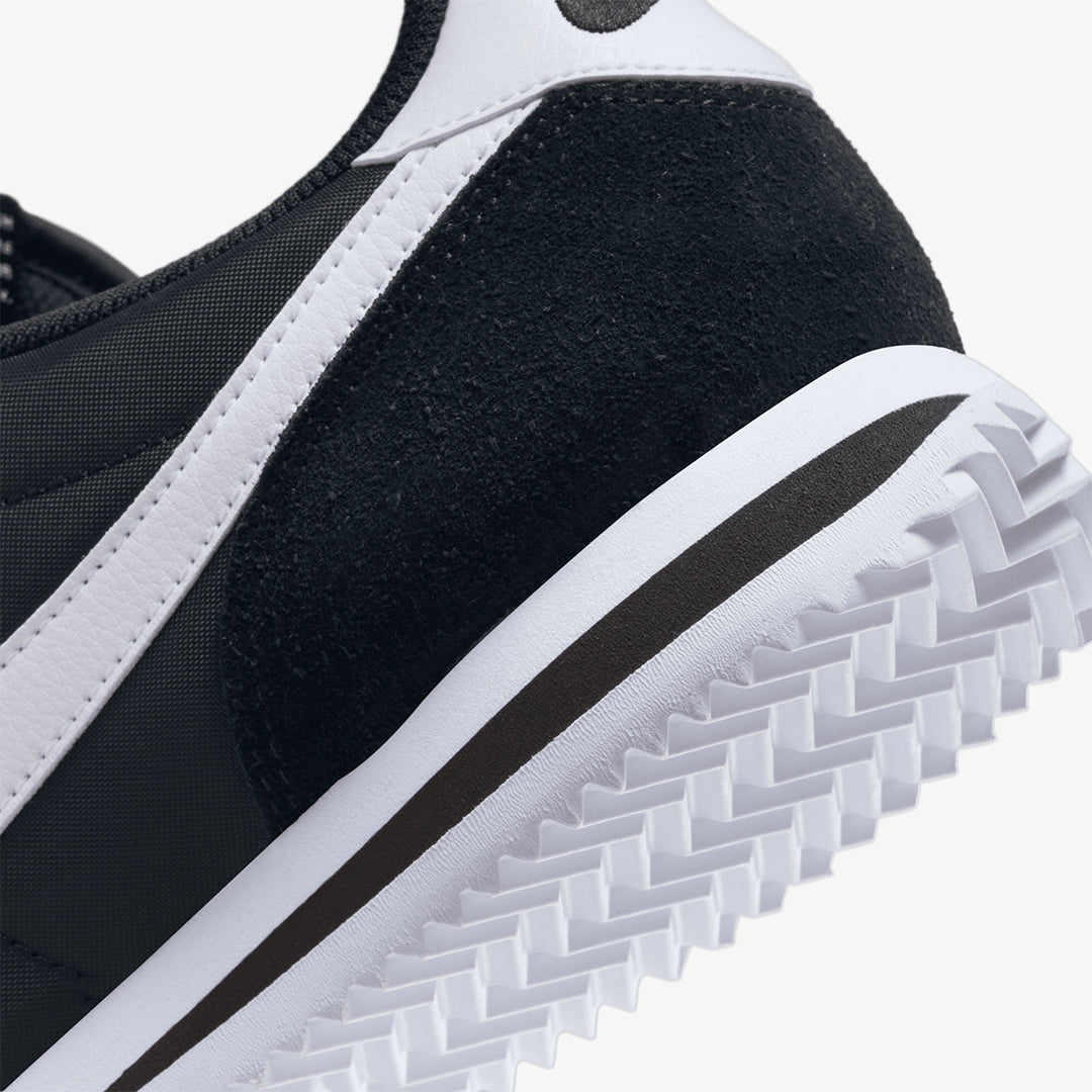 Nike | CORTEZ TXT { BLACK/WHITE