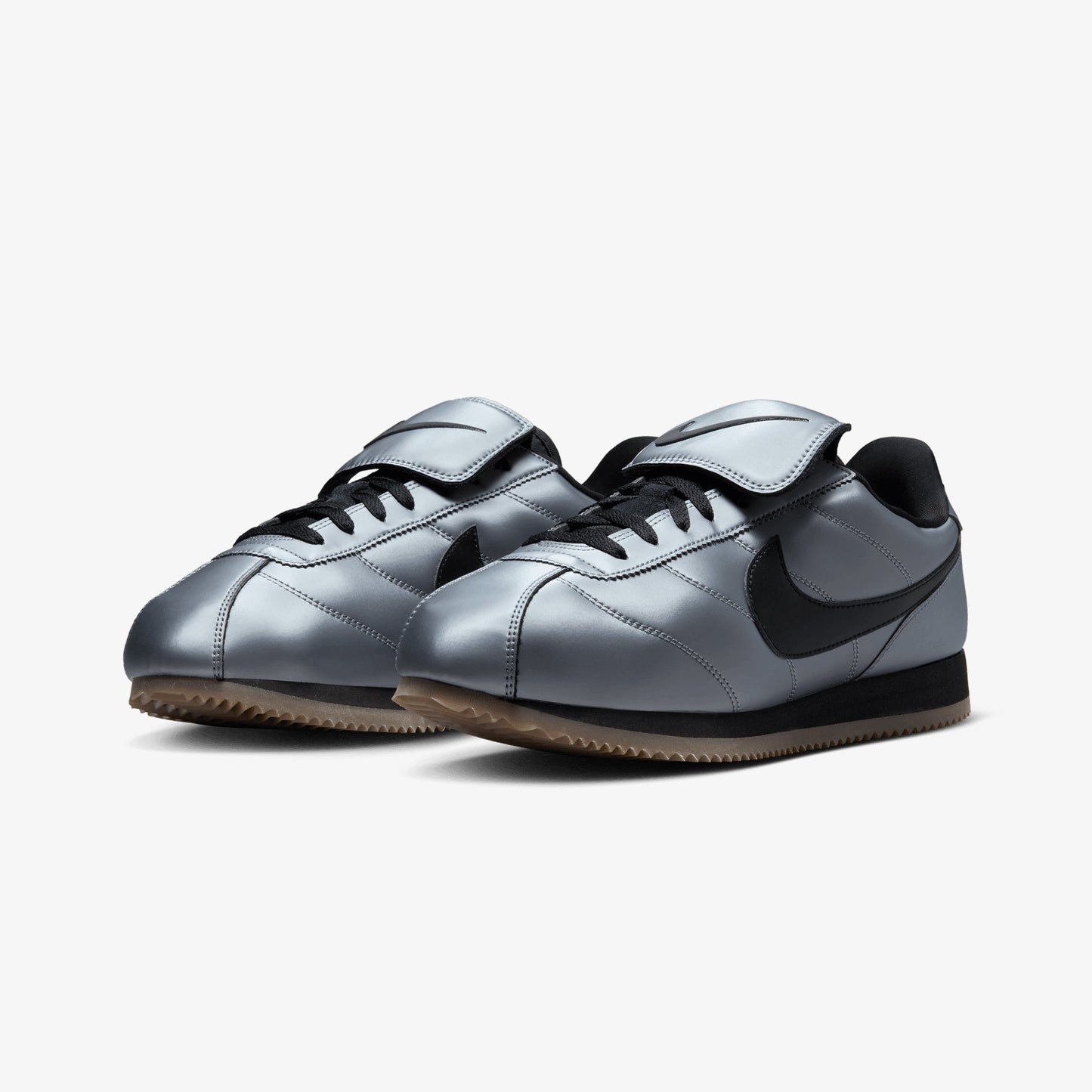 NIKE | CORTEZ { MTLC COOL GREY/BLACK-GUM DARK BROWN