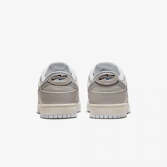 Nike | DUNK LOW  { METALLIC SILVER