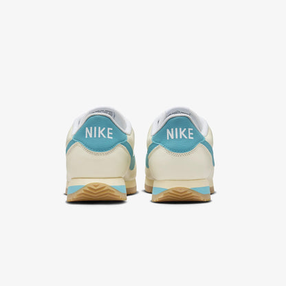 Nike | CORTEZ TXT  { COCONUT MILK/TEAL NEBULA-GUM YELLOW