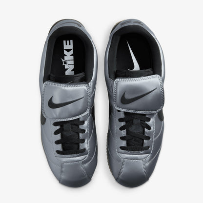 NIKE | CORTEZ { MTLC COOL GREY/BLACK-GUM DARK BROWN