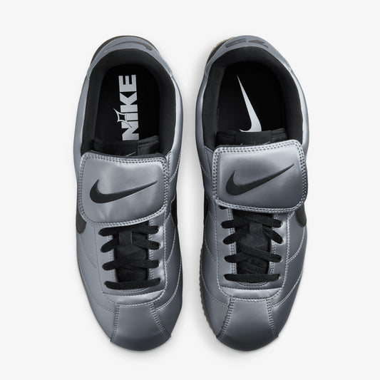 NIKE | CORTEZ { MTLC COOL GREY/BLACK-GUM DARK BROWN