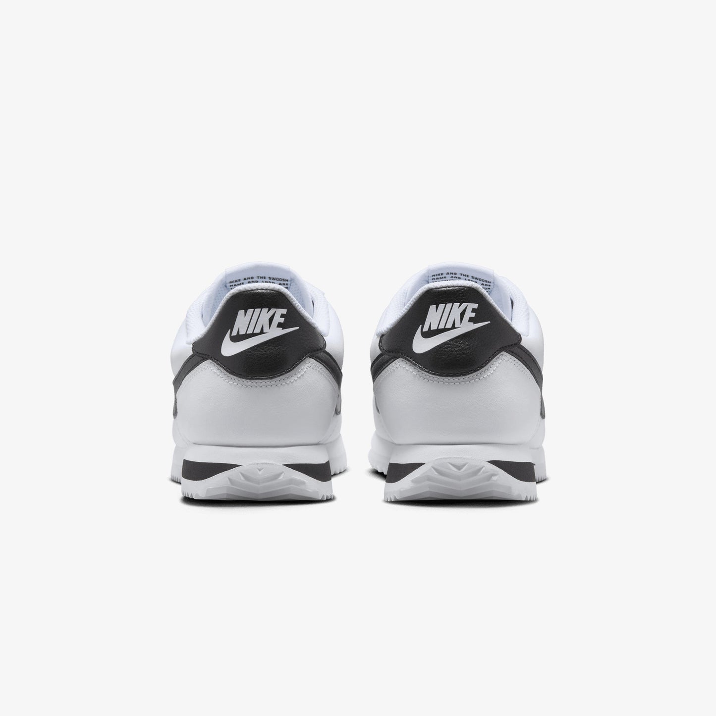 NIKE | CORTEZ LEATHER { WHITE/BLACK