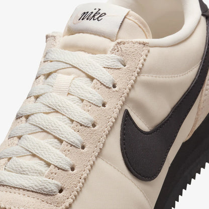 NIKE | CORTEZ TEXTILE { GUAVA ICE/BLACK-SAIL-PHANTOM