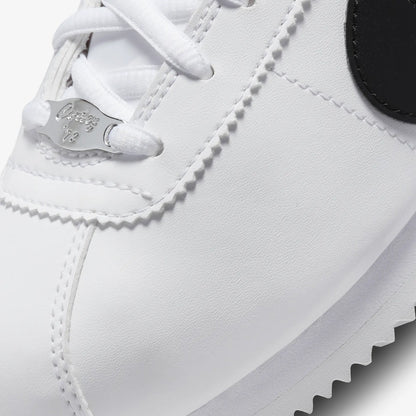 Nike | CORTEZ BASIC SL  { WHITE/BLACK