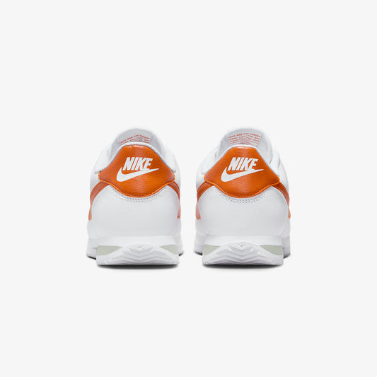 Nike | CORTEZ  { WHITE/CAMPFIRE ORANGE-JADE HORIZON