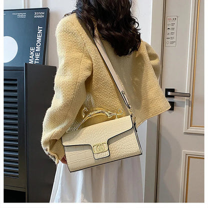 Stylish Leather Crossbody Bag with Designer Metal Handle